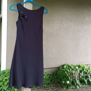 Black dress with flower and silk back